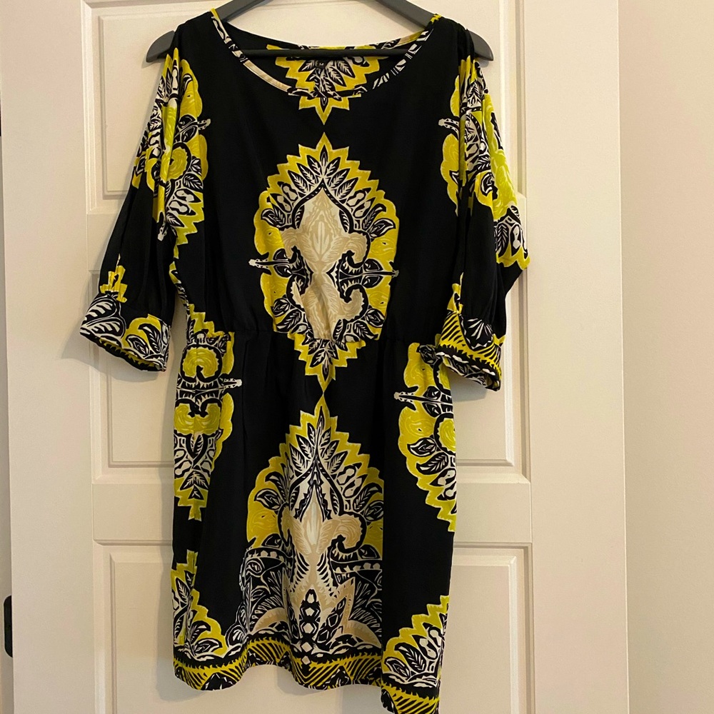 Black dress with bold designs and subtle cutouts